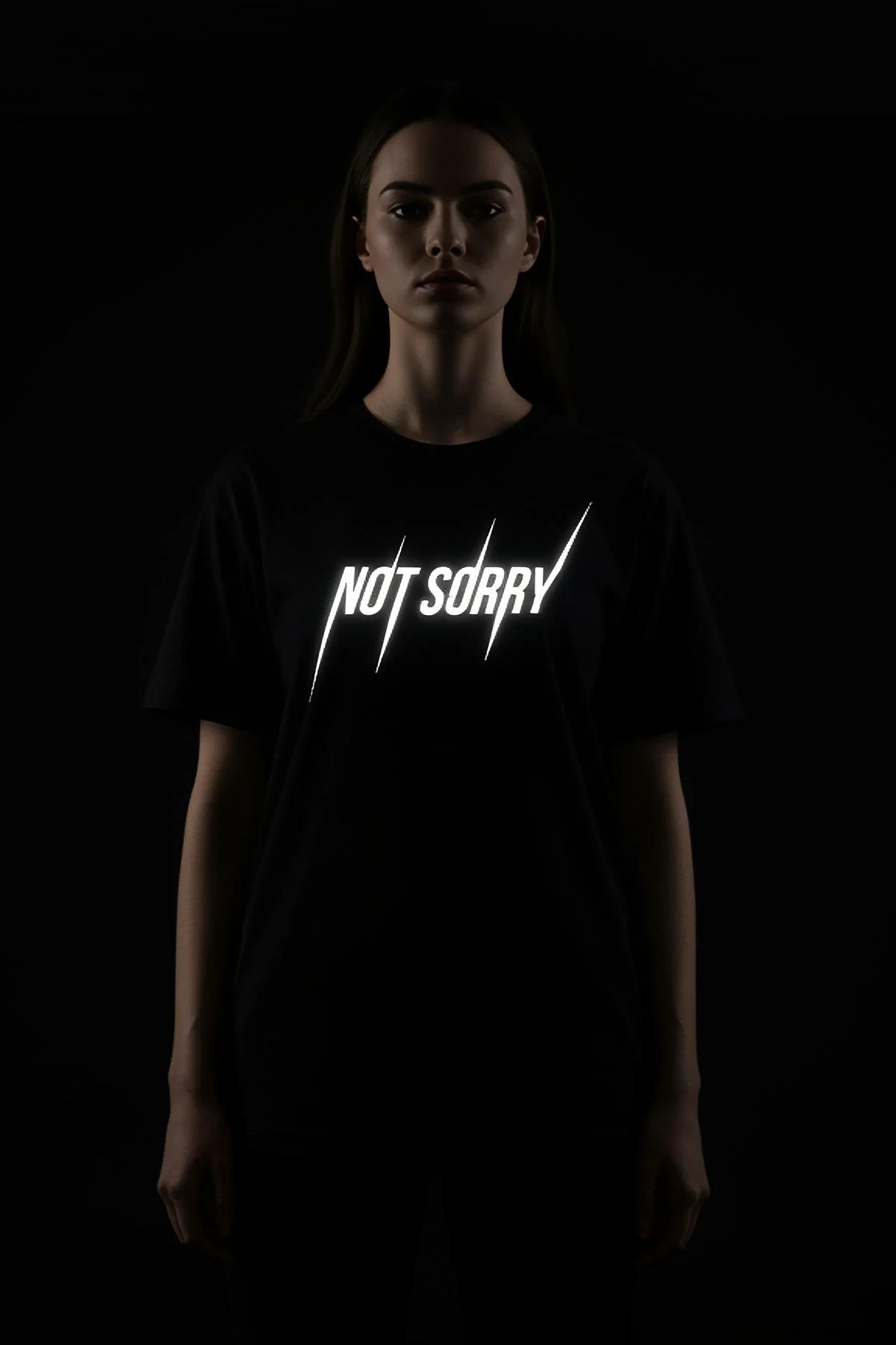Festival black graphic top with reflective "
