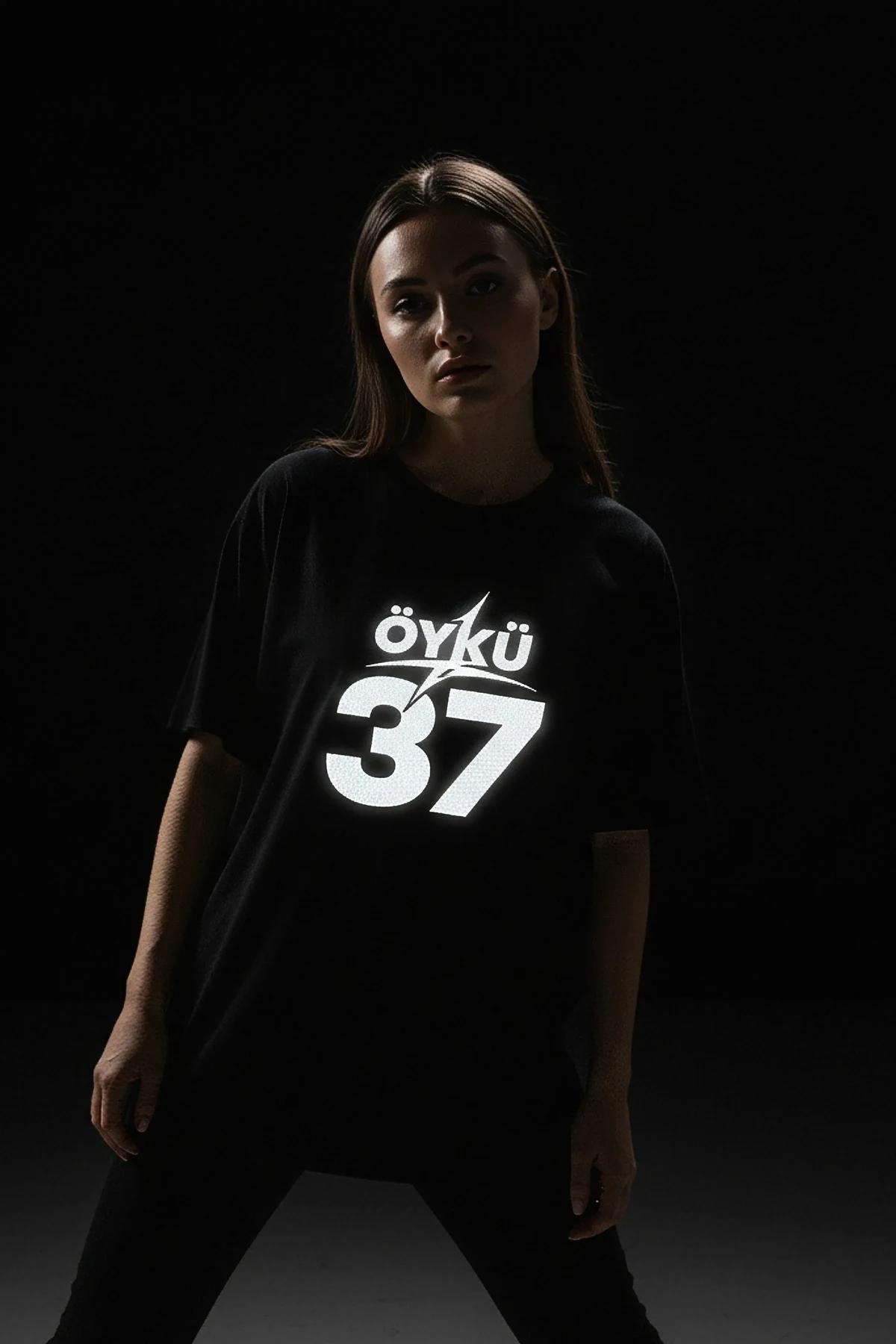 Black Reflective Graphic Oversized T-Shirt featuring "ÖYKÜ 37" print