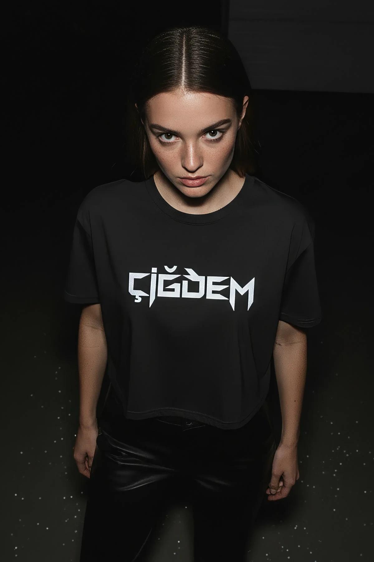 Black crop top with white logo text and