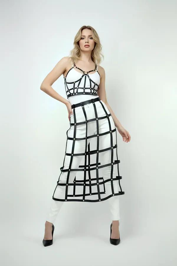 Women's Leather Harness Top and Grid Skirt Statement Outfit