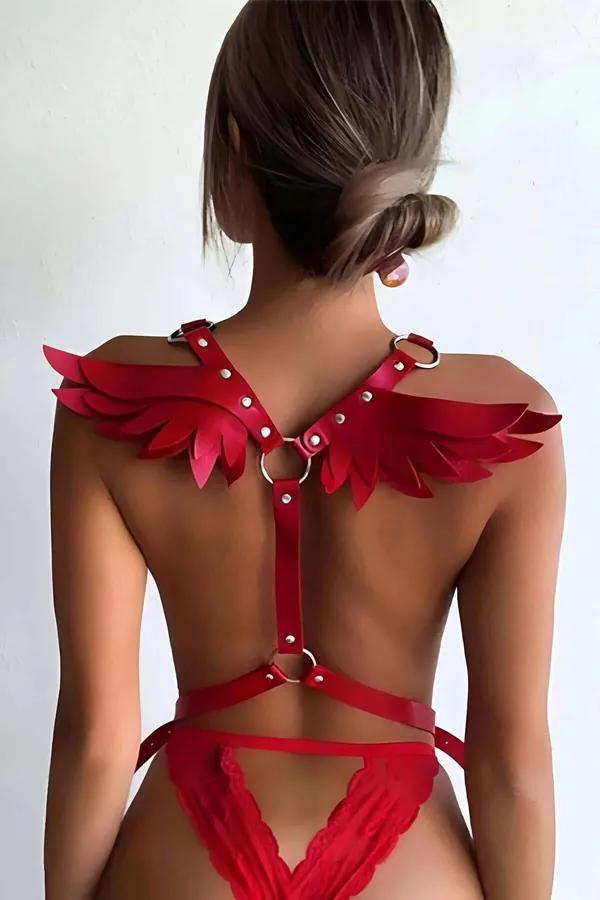 Red faux leather angel wing body harness with silver O-ring connectors shown from the back on a model